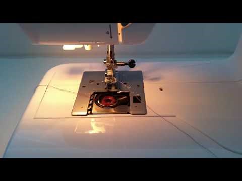 How to thread a sewing machine - picking up the bobbin thread.