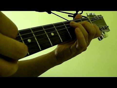 How To Press and Pluck Guitar Strings (Beginner Lesson)