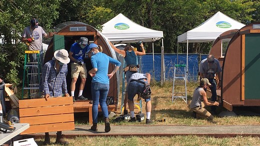 'Giving them a little bit of a helping hand': New conestoga huts go up in Eugene