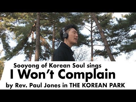 Sooyong sings "I Won't Complain" in the park.