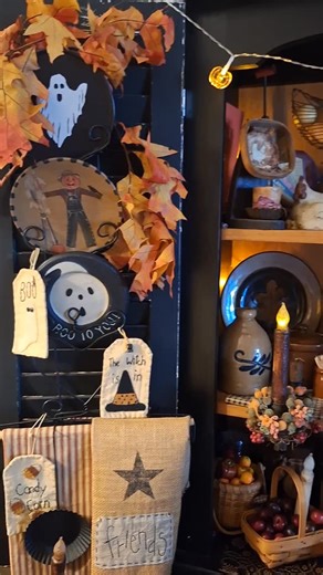 🍂✨ My cozy little fall hutch is all dressed up and ready for the season! Primitive treasures, warm autumn tones, and little pops of pumpkins and leaves make it feel like a slice of harvest time right inside my home. I just love how the twinkle lights and handmade touches bring it all together. 🍁🕯️ Do you decorate your hutch for fall? 🍂 #FallHutch #PrimitiveDecor #AutumnVibes #CozyFall #HarvestHome #PrimitiveStyle #FallDecorating #PumpkinSeason #RusticCharm #PrimitiveHutch #CottageCoreDecor #