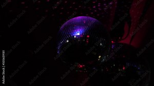 Close up footage of disco ball in night club.