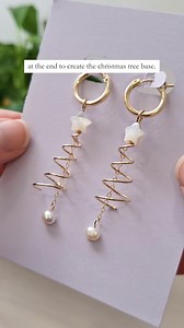 🎄 Festive earring idea? 👆️🎁🎄⁠ ⁠ Ready for a holiday jewellery DIY you can make in minutes? ⏱️🎄⁠ ⁠ We’re crafting Christmas tree earrings using gold-filled wire, mother-of-pearl star toppers ⭐ and optional chain pearl drops for added sophistication 🤍⁠ ⁠ Comment “materials” and we’ll send you a list of everything you’ll need. #Christmas #ChristmasTree #Earring #DIY #DIYEarring #DIYJewellery #Jewellery #JewelleryMaking #Spiral #Wire #GoldFilled #WireJewellery #Christmasearring #WireWrapping #