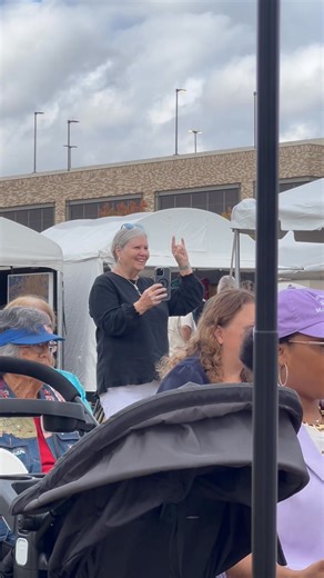 TCU graduate Gene Lamb conducts The Eyes of Texas as a passionate UT fan flashes her horns in celebration at the Art Worth Festival on Saturday! | Fort Worth City Band