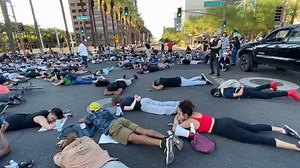 81K views · 1.8K reactions | Hundreds of protesters lay on their stomachs in downtown Phoenix for 8 minutes and 46 seconds – the amount of time a police officer had his knee on George Floyd's neck before Floyd lost his life. https://bit.ly/3gXyAYt | 12News | Facebook