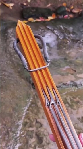 A crossbow slingshot that can shoot three arrows Shot 3