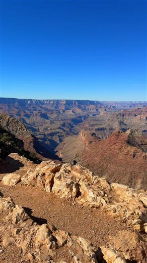 You don’t truly understand or appreciate just how large the Grand Canyon is until you go. It’s absolutely massive, and “Grand” doesn’t even begin to describe what you’re looking at. The feeling of being at the edge is unlike anything else. #grandcanyon #grandcanyonnationalpark #explorearizona #visitarizona #travelwithme | Destinations with Drew-Travel Tips & Hidden Gems
