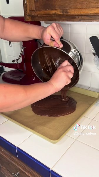 Ice cream sandwiches. In a large mixing bowl, add 2 cups sugar and 1 cup oil (I used olive oil). Give it a good mix. Add 4 eggs, making sure to add 1 egg at a time and mixing between each add. Once your eggs are fully incorporated, add 1/3 cup cocoa powder, 1 tsp salt, 1 tbsp vanilla extract, and 1 1/2 cups all purpose flour. Mix until fully incorporated. Once mixed, spread in a thin even layer on your largest parchment paper lined baking sheet. Bake at 350 for 15-20 minutes or until a toothpick