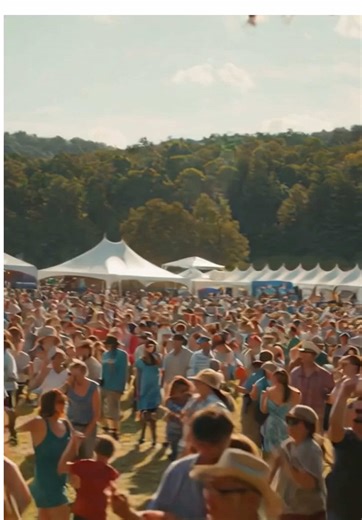 “Summer Strings in Motion” Upright bass driving the groove, strings flying, and a crowd that can’t stop dancing. At a sunny outdoor bluegrass festival, EJ plays upright bass fiddle with a full string band including acoustic guitars, banjo, mandolin, dobro, fiddles, and a female singer. The crowd dances enthusiastically as the band performs with high energy. #BluegrassFestival #UprightBass #LiveMusic #SummerVibes #StringBand