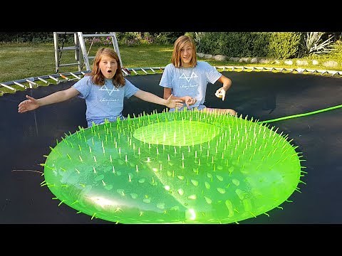 TRAMPOLINE vs GIANT SPIKED WATER BOMB!