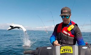 Jet Ski Fisherman Nearly Loses It When A Mako Shark Flips Out Of The Water Next To Him