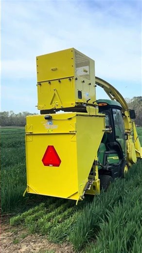 Forage harvester harvesting cool-season forages by Dr. Liliane Silva
