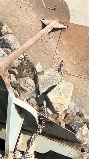 Caterpillar Loader Feeding Rocks into Jaw Crusher | Powerful Stone Crushing Action