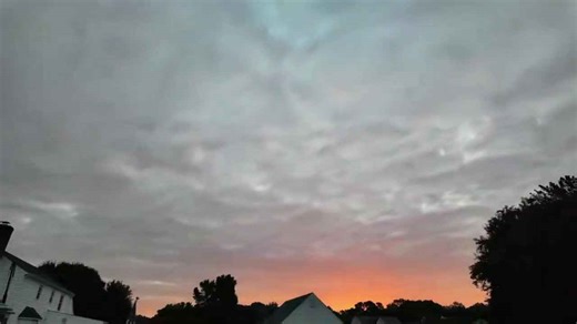 Sunrise breaks through after days of gray skies in Chester, Virginia, USA