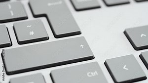 Finger pressing the shift key close up shot