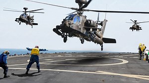 Powerful US Attack Helicopters Landing on Moving Navy Ship in the Ocean