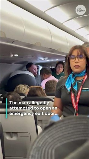 Unruly passenger diverts Frontier flight. See travelers restrain him.