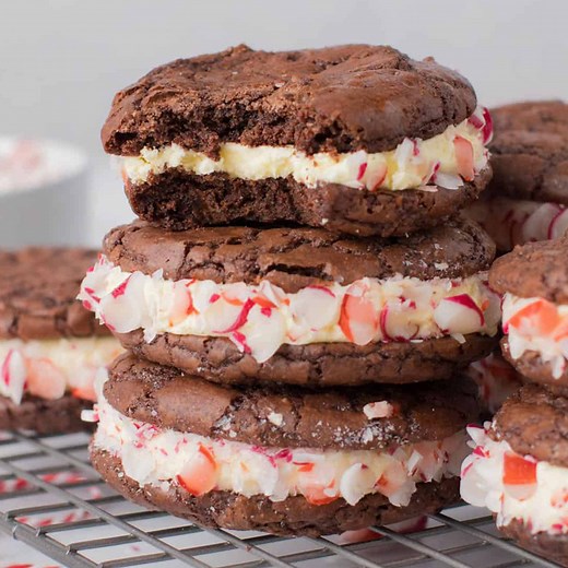 These Candy Cane Brookies are the best of both worlds! Fudgy brownie filled with delicious cream cheese frosting and covered in candy canes! RECIPE LINK 🔗 IN THE COMMENTS! ⬇️ | The Scran Line