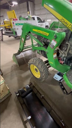 Doing a service on a 3038E John Deere compact tractor