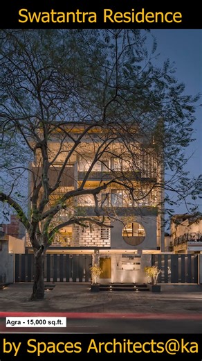 Orignal credits Agra, India Architects: Spaces Architects@ka, Area: 15000 ft², Year: 2023, "Discover a stunning 15,000 sq. ft. sustainable residence in Agra, designed by Spaces Architects@ka. This home seamlessly blends concrete aesthetics, art, and functionality to create a perfect space for three generations. From a triple-height courtyard at the core to a sustainable design with solar panels and rainwater harvesting, every detail reflects thoughtful architecture. Explore its detailed floor pl