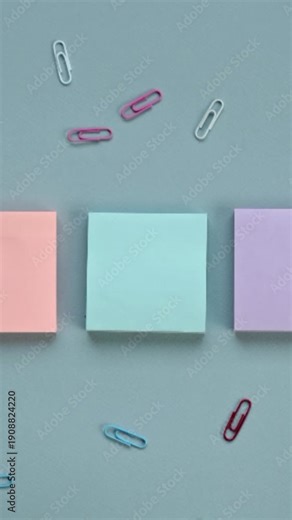 pink paper clip and paper