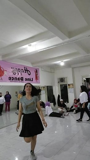 Happy Line Dance Routine with Women in Casual Attire