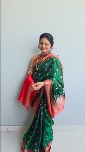 Book your beautiful green Banarasi silk saree with lotus and swan blouse from Shitaltai Collectio...