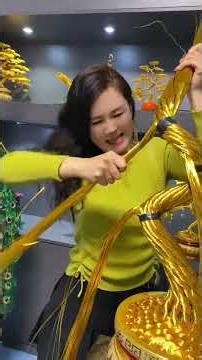 Self-made "Iron Tree Blooming": 14-year-old girl weaves artistic tree with 10,000 threads