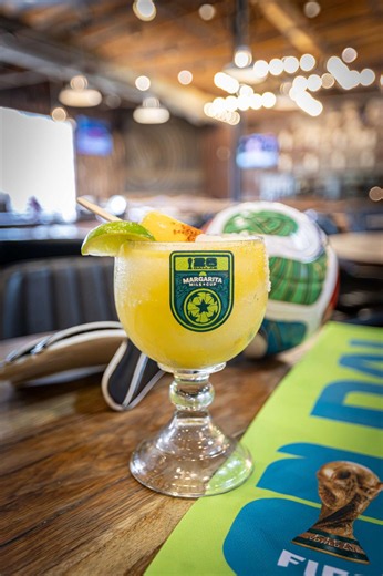Some margaritas are a sip. This one is a whole moment.🍹🧊🍋‍🟩 The Legendary Rustic Rita at The Rustic Dallas has a classic frozen base with handcrafted mango extract sour mix, and it's topped with a mango popsicle infused with tequila and dipped in Tajín for an extra pop of flavor! It just so happens to be the perfect fuel for a soccer-filled summer day. Download the FREE Margarita Mile pass, check in, and cast your vote. Link in bio. Must be 21 . Please drink responsibly. #MargaritaMile #Visi