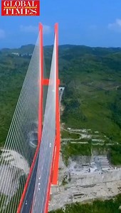 #WondrousChina A stunning video of the world’s longest steel-truss, cable-stayed bridge in Southwest China’s Guizhou Province! Spanning 800 meters in length and at a height of 434 meters, this spectacular construction opened to traffic in 2016. | Global Times