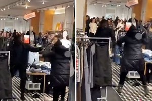 Shocking moment two women brawl at Oxford Street store during Boxing Day sales before security forced to step in