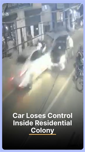 49K views · 49 reactions | A speeding car loses control and crashes into another vehicle inside a residential colony, sparking chaos but miraculously no major injuries reported. Residents share shocking dashcam footage of the near-death incident. #safety #roadaccident #residentialchaos #near-death #viralvideo #speedingcar #crashcaughtoncamera #trafficalert #india #dashcamfootage | Indiatimes | Facebook