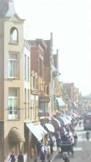 38K views · 4.8K reactions | Restored footage from 1913 showing pedestrians, cyclists, carriages, and trams on a street in Haarlem, Netherlands. Footage frame rate increased, upscaled and “colorized” by HistoryColored using AI technology. Footage originally from: Stadsgezichten van Haarlem - Acte 1, OpenBeelden, Public Domain Music: Mindstream / Amber Glow / Epidemic Sound #history #netherlands #haarlem #historicalfootage | History in Color | Facebook