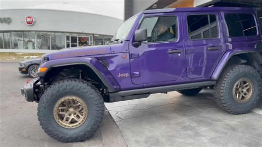 10K views · 140 reactions | PURPLE REIGN has arrived. Our custom 2026 Jeep Wrangler Rubicon X just rolled out of the showroom - complete with AEV Borah wheels, 37” Toyo Tires, and AEV 2” Lift. | Cross Chrysler Jeep Fiat | Facebook