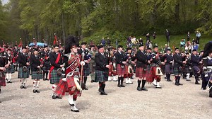 The massed Highland Pipe Bands playing outside beautiful Dunrobin Castle by Golspie Village in Sutherland on Saturday 27th April 2019. This was part of the Highland pipe band fundraising event for TYKES - The Young Karers East Sutherland. The tunes pereformed were 'High Road to Gairloch' 'Brown Haired Maiden' and 'Highland Laddie' Visit Sutherland Led by leading Drum Major Duncan Macdonald, the ten bands present were Sutherland Caledonian Pipe Band, Royal Burgh of Tain Pipe Band, Strathpeffer an