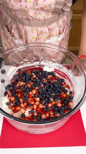 The perfect dessert for a summer potluck Kyra makes a patriotic and easy no bake berry cheesecake salad using red, white and blue colors. | Kyras Kitchen