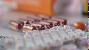 Money with medicines and pills. Economic aspects of healthcare.