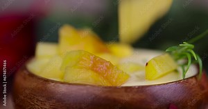 fresh yogurt with peach flavor and aroma and pieces of fresh peach, homemade peach yogurt on the table