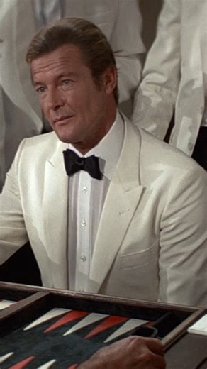 "It's all in the wrist" Delve into the history of backgammon and poker on- and off-screen now at 007.com, and find new game sets by Globe-Trotter at 007Store.com https://007store.com/collections/james-bond-globe-trotter | James Bond