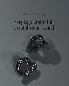 Hand-finished with Swarovski Crystals, these limited-edition Swarovski x Loop earplugs reimagine hearing protection as jewelry. Plated in glossy chrome and set with Swarovski’s signature octagon crystals in 3D-printed bezels, they blend bold design with cutting-edge sound technology: 👉 Hand-finished details 👉 Precise sound control 👉 Bespoke ear tips for all-day comfort 👉 Stainless-steel durability 👉 Special-edition Carry Case Experience them today with 100-day, hassle-free returns. | Loop