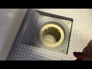 Procedure for disassembling the drain of a TOTO unit bath