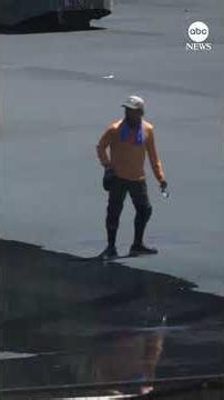 Problems with Reflecting Pool renovation as paint peels, algae blooms