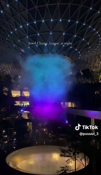 Experience the Rain Vortex Light Show at Jewel Changi
