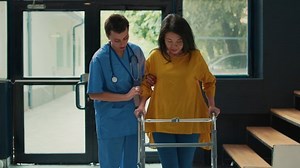 Female Nurse Helping Patient Leg Injury Stock Footage Video (100% Royalty-free) 1097333015 | Shutterstock