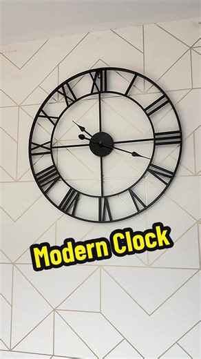 Modern & sleek black silent ticking clock - the perfect touch for your living room, dining room, or any space that needs style and calm. Effortless elegance, no ticking noise, just timeless vibes! #HomeDecor #SilentClock #ModernStyle #Living RoomGoals #DiningRoomDecor