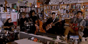 Jon Batiste Showcases New Band Ft. Ghosts Of The Forest's Celisse Henderson On NPR's 'Tiny Desk' [Watch]