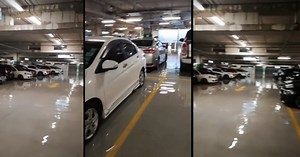 Watch: Downpour causes flooding in KL shopping centre carpark | New Straits Times