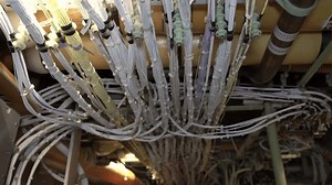 Routing of wire bundles in the main electronics bay of a commercial aeroplane.