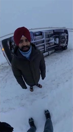 U-Haul truck flips over into ditch