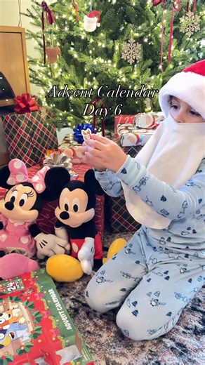 Elisa Valdez on Instagram: "He was feeling extra festive this morning🎅🏽 • • • • • • #AdventCalendar #ChristmasMagic #CountdowntoChristmas #Santa #MomLife #MickeyMouse #MinnieMouse"